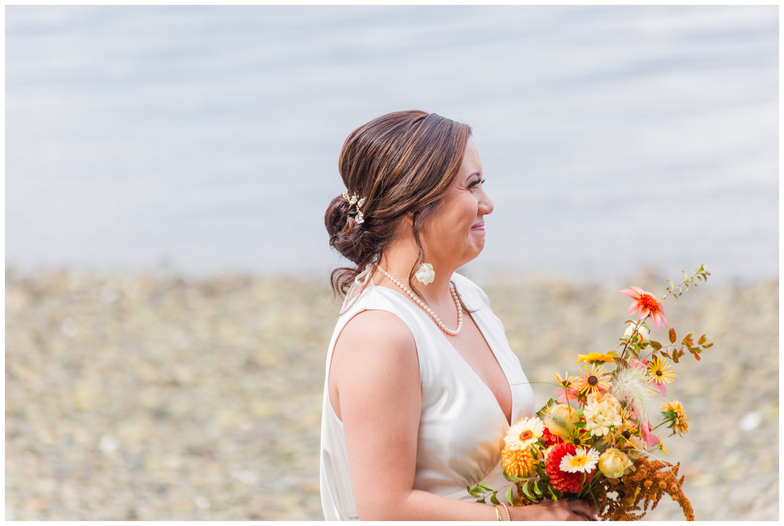 Bride smiling looking at Groom Seabeck Elopement